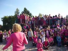 RES' Students/Staff Prepare for their Large Group Photo on Pink Shirt Day!